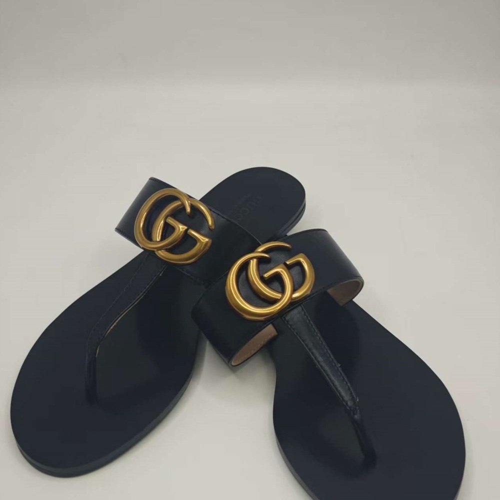Gucci Black Flip-Flops with Gold Emblem